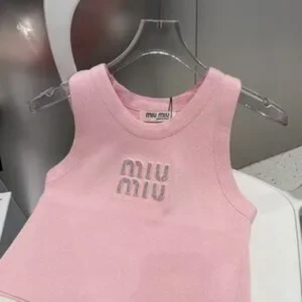 Authentic Miu Miu Black Vest with Elegant Design